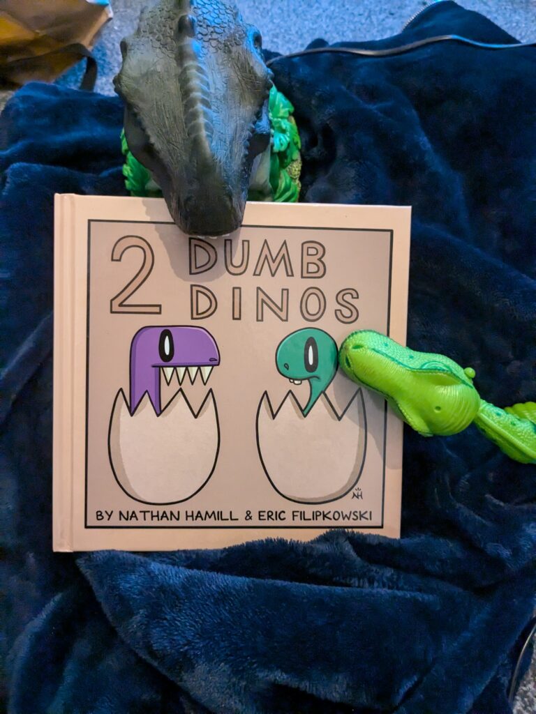 PXL 20241030 104217828 768x1024 - 2 Dumb Dinos by Nathan Hamill and Eric Filipkowski